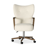 A comfort-driven desk chair features soft, textural upholstery, framed by solid ash arms. A height-adjustable swivel base with casters makes for ease in the modern office. Amethyst Home provides interior design, new home construction design consulting, vintage area rugs, and lighting in the Salt Lake City metro area.