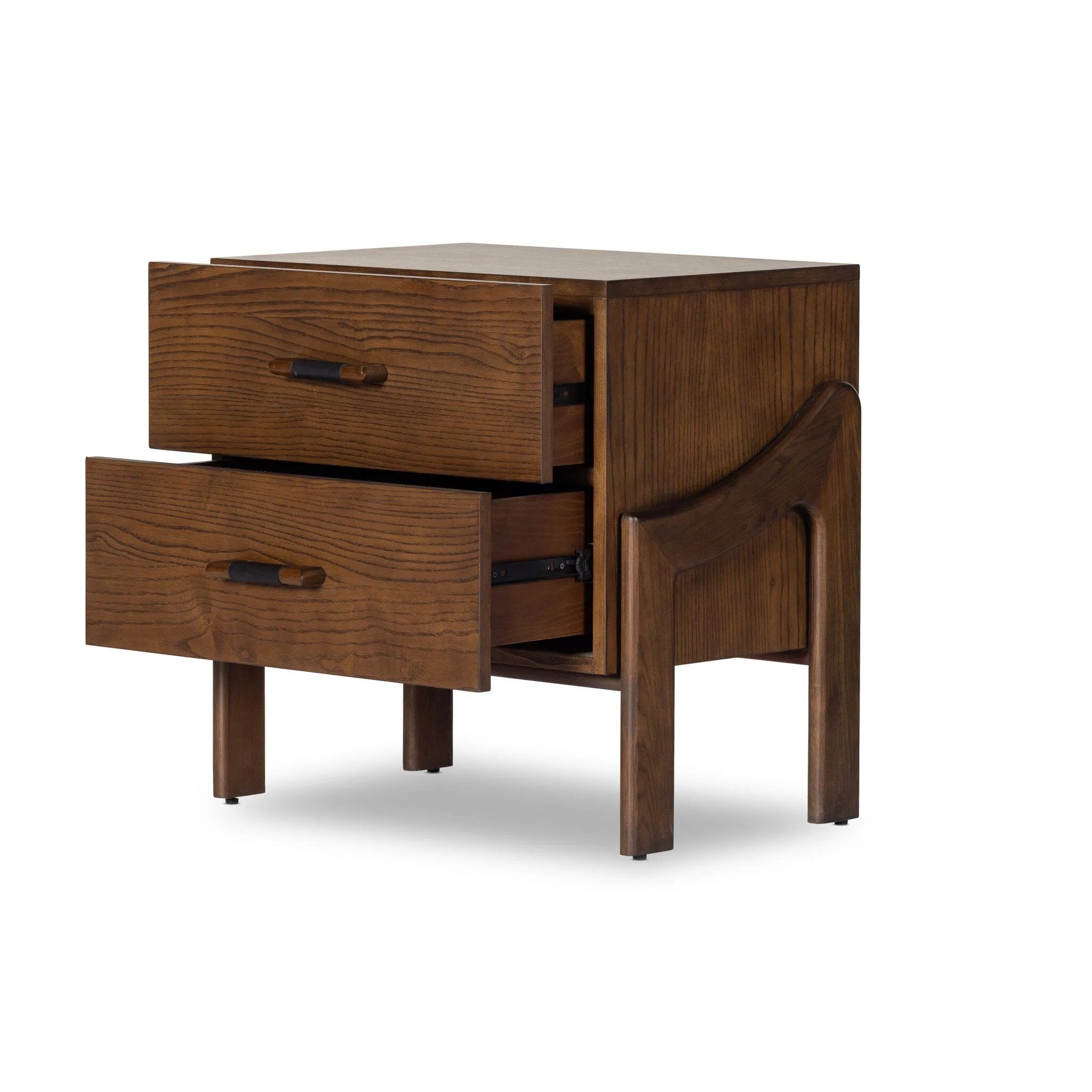 Made from brown-finished ash with leather-wrapped hardware, wide scale and sculptural details reflect the Brazilian midcentury inspiration behind this dual-drawer nightstand Amethyst Home provides interior design, new home construction design consulting, vintage area rugs, and lighting in the Houston metro area.