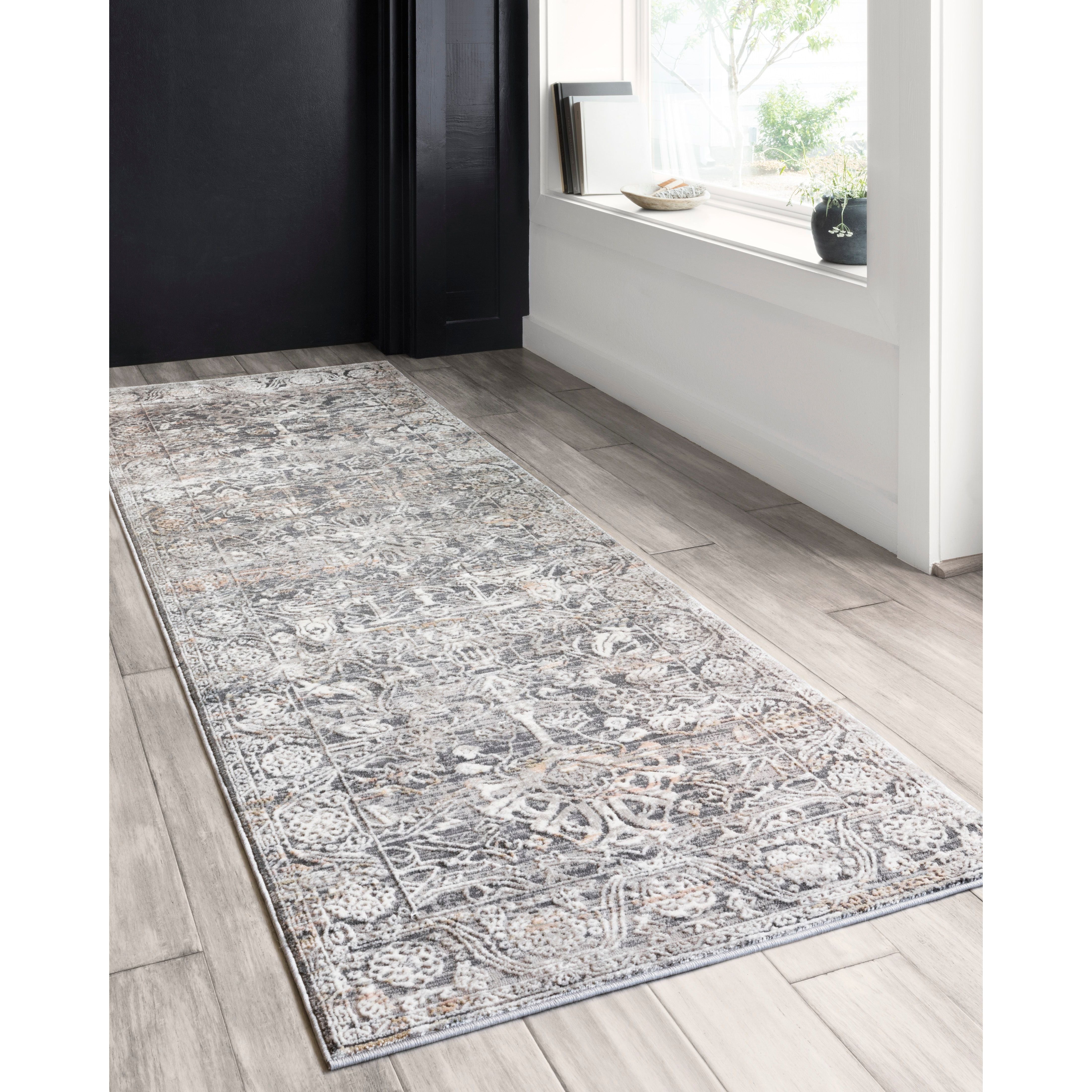 Lucia Steel/Ivory Rug - Amethyst Home The Lucia Collection is a beautifully rich statement piece to add a layer of sophistication to any room. Power-loomed of polypropylene & polyester with a high/low pile and a curated color palette for a high-end look at an affordable price.