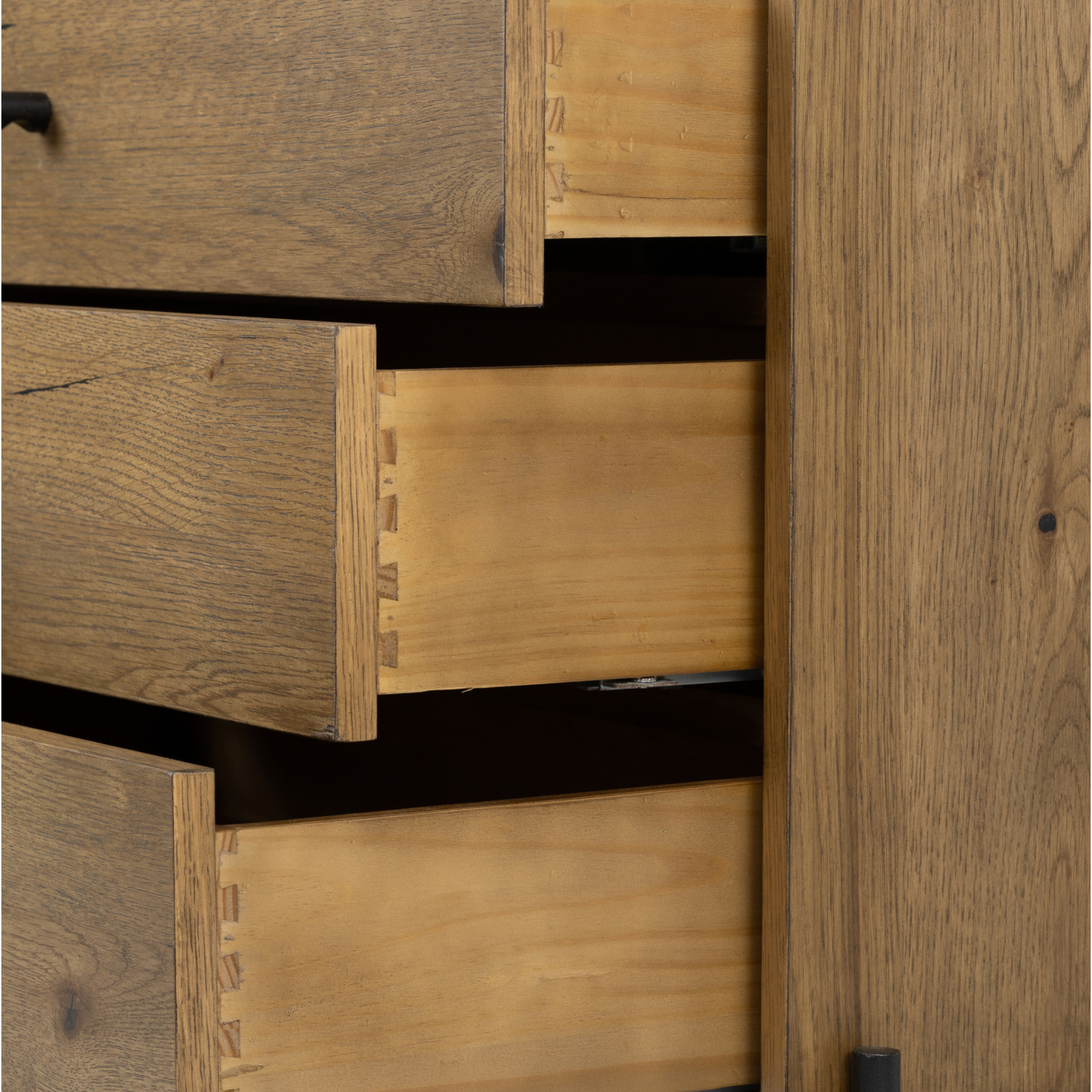 Clean and streamlined. Amber-finished oak features three large drawers plus gunmetal-finished hardware, for a look that's always in style. Dark resin plays up woods' natural graining.