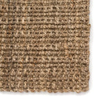 This hand-spun jute Naturals Lucia Achelle Area Rug by Jaipur Living, or NAL03, offers a neutral foundation to transitional homes. Perfect for textile layering and coastal appeal, this texture-rich natural layer lends an eco-friendly accent in a warm-toned taupe hue.