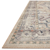 Featuring soft motifs in a carefully curated color palate of ivory, blue, green, and hints of purple, the Hathaway Multi / Ivory area rug captures the essence of one-of-a-kind vintage or antique area rug at an attractive price.