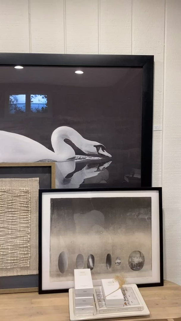 Gliding quietly along the river, this framed view of the swan is captured beautifully in this Gliding Swan Art.  Size: 56"w x 43"h Medium: Matte