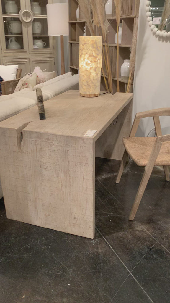 The simple construction of our Merwin Desk highlights the inherent beauty of the wood. Visible grain and knots give each piece its warm, individual character, and the open design leaves space for inspired styling. The whitewash finish brings a rustic, farmhouse feel to any office, living room, or other space.   Amethyst Home celebrates natural materials, which often come with beautiful imperfections. Each piece is made uniquely for you! Please expect some variation and character -- we embrace the design app